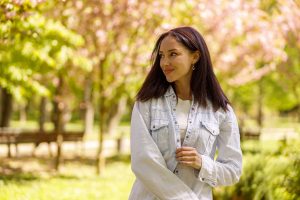 romantic-attractive-female-walking-in-park-on-sunn-2023-11-27-05-08-43-utc (1)
